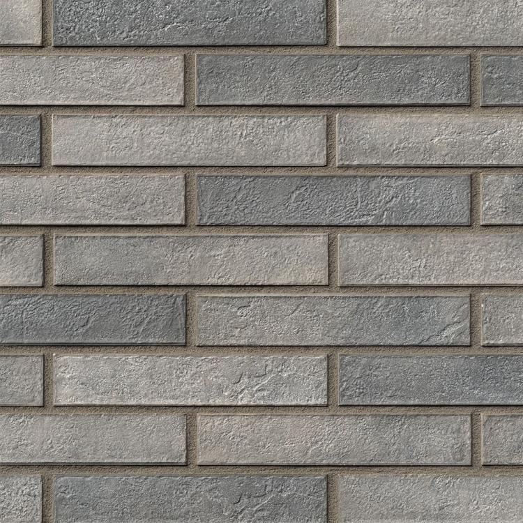 Graue Ziegelsteinmauer mit horizontalem Muster.