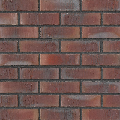 Rote Backsteinmauer mit gleichmäßigen Fugen.