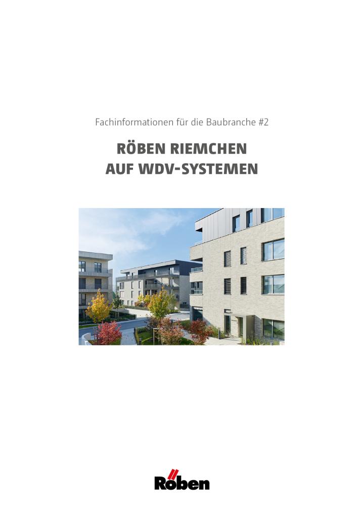 Foto von modernen Gebäuden im Herbst, blauer Himmel, grüne und rote Pflanzen.